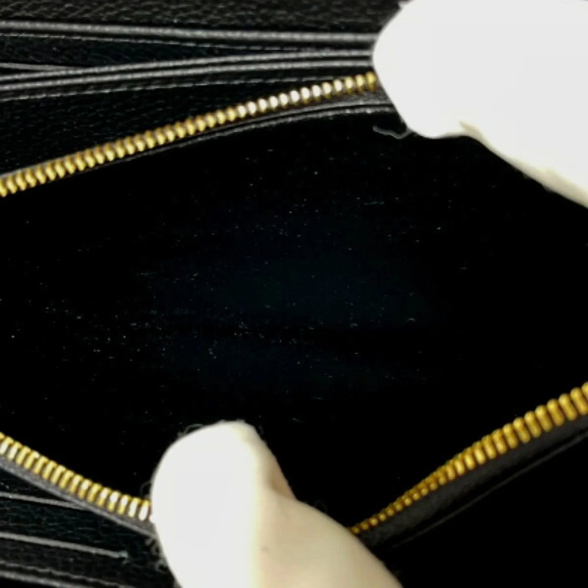 Pre-Owned LOUIS VUITTON Round Zipper Monogram Empreinte Zippy Wallet M61864 Louis Vuitton Noir Long LV (Good)