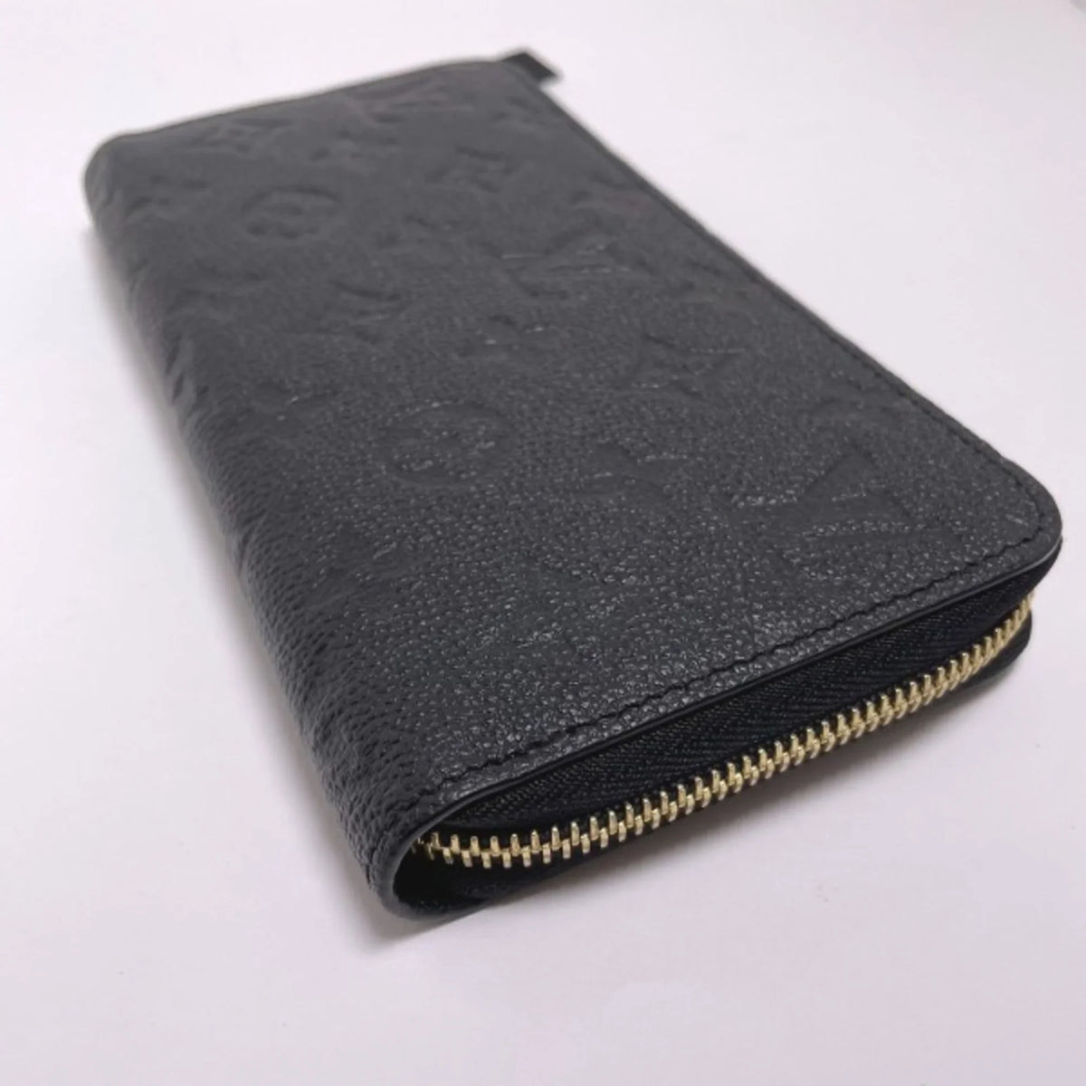 Pre-Owned LOUIS VUITTON Round Zipper Monogram Empreinte Zippy Wallet M61864 Louis Vuitton Noir Long LV (Good)